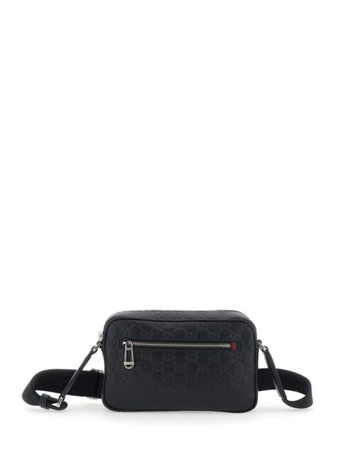 GUCCI Gucci Men 'Emblem' Black Crossbody Bag With Adjustable Shoulder Strap And All-Over Embossed Gg Motif