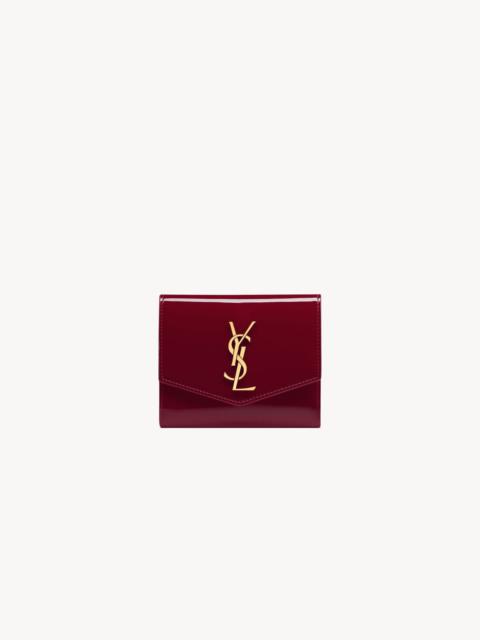 SAINT LAURENT UPTOWN COMPACT WALLET IN PATENT LEATHER