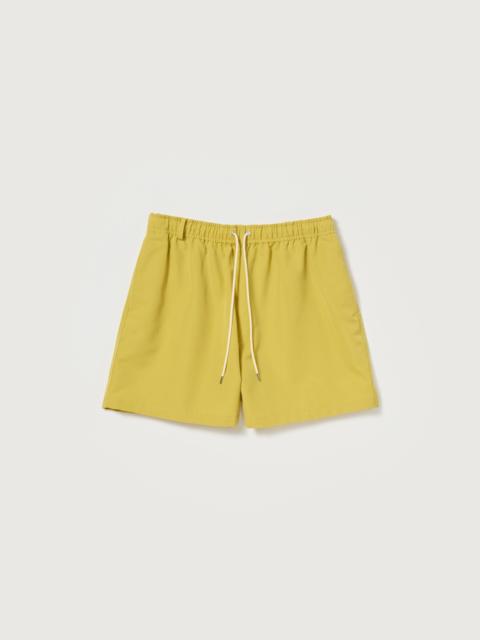 AURALEE WOOL MAX CANVAS SHORTS