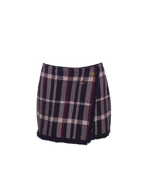 Cara Cara Jodi Mini Skirt
Fringed, Wrapped, and Pinned with Polish