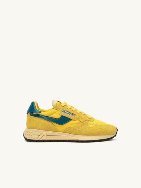 AUTRY REELWIND LOW SNEAKERS IN YELLOW AND CORSAIR SUEDE AND NYLON
