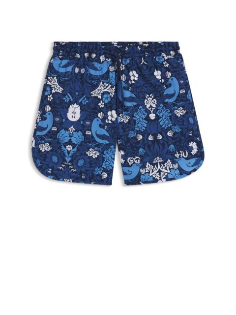 HUGO PRINTED SWIM SHORTS WITH EMBROIDERED LOGO