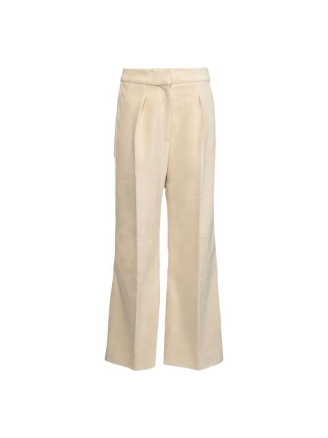 KHAITE pleated-front trousers