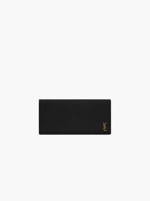 SAINT LAURENT TINY CASSANDRE FLAT WALLET IN GRAINED LEATHER