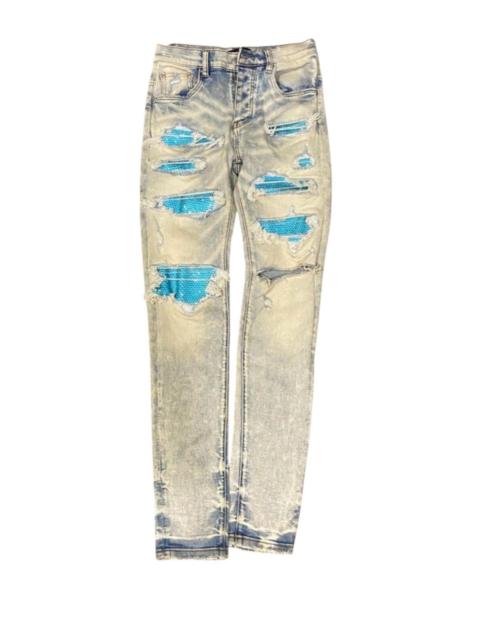 AMIRI Amiri distressed patchwork style jeans