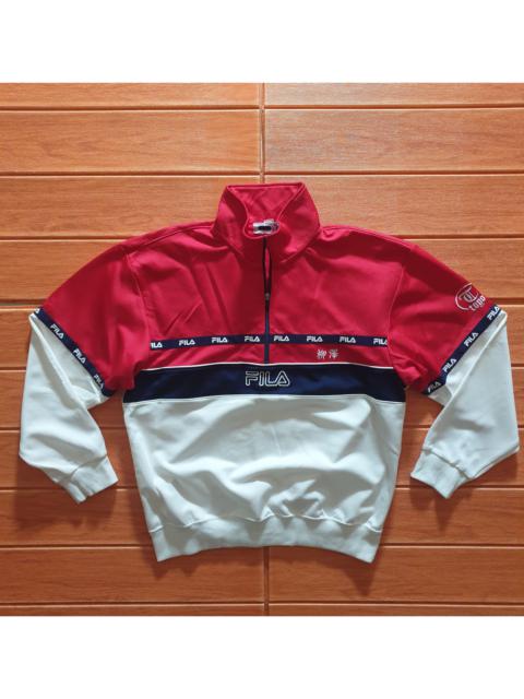Archival Clothing - Vintage fila half zipper sweater