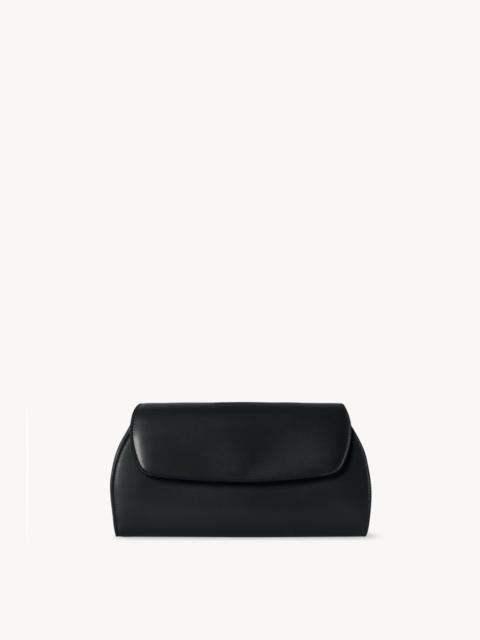 The Row Curved Clutch in Leather