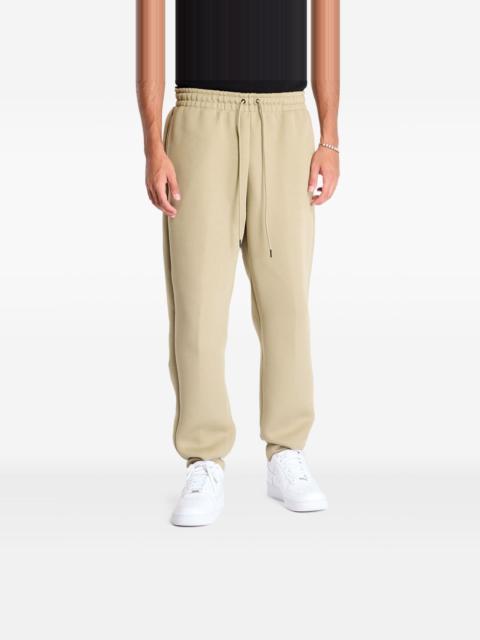 Nike elastic-waistband fleece trousers