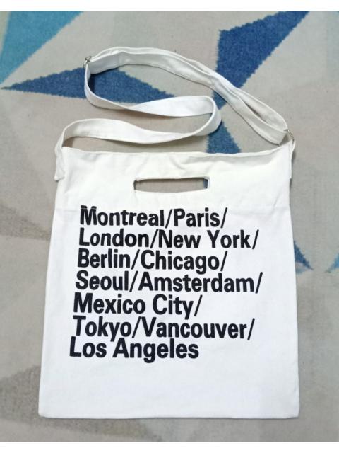 Other Designers Free City - Magazine Sling Bag