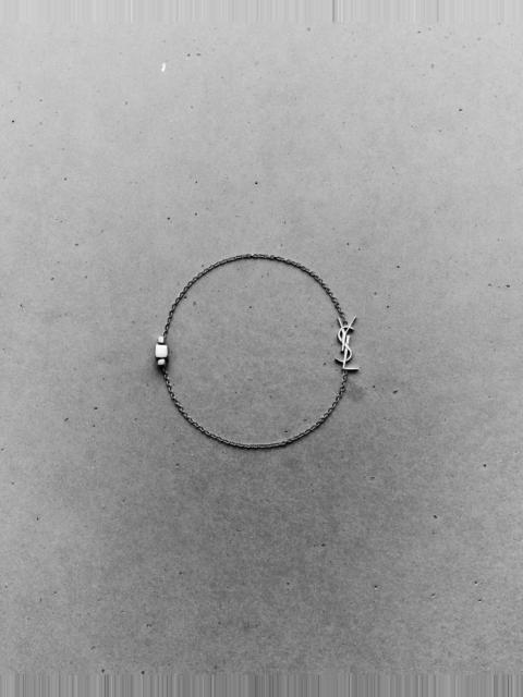 SAINT LAURENT CASSANDRE BRACELET IN 18K GREY GOLD