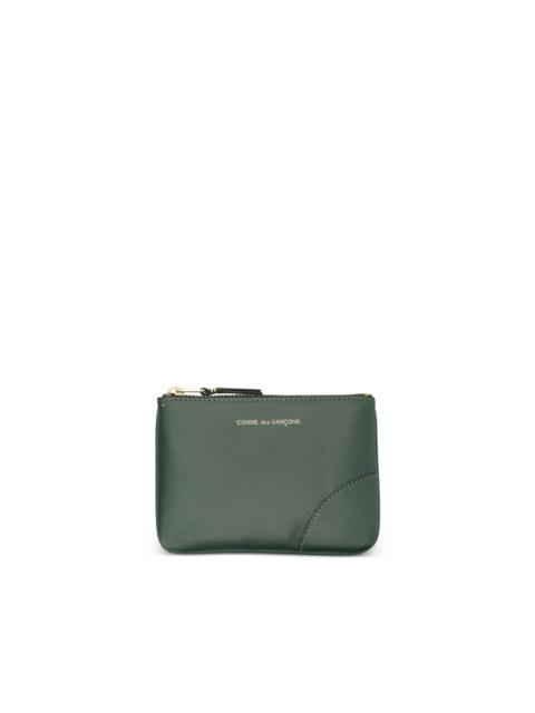 Comme Des Garçons leather wallet