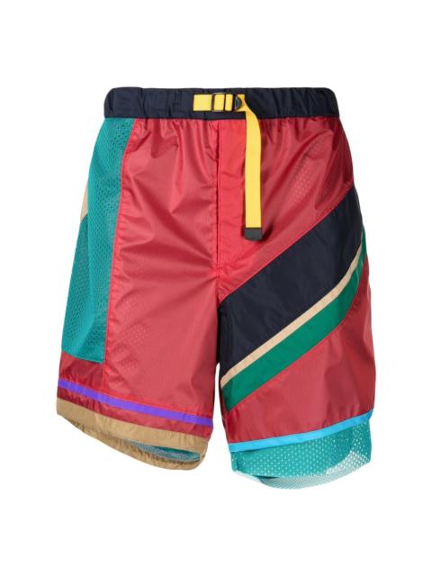 Kolor patchwork-panelled sports shorts