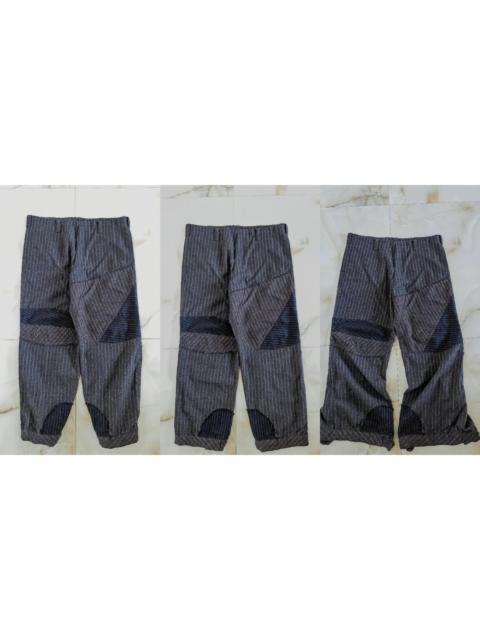 Yohji Yamamoto Yohji Yamamoto wool distressed patchwork triple-wear trousers
