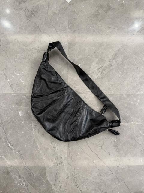 Lemaire Lemaire black large waxed leather croissant bag.