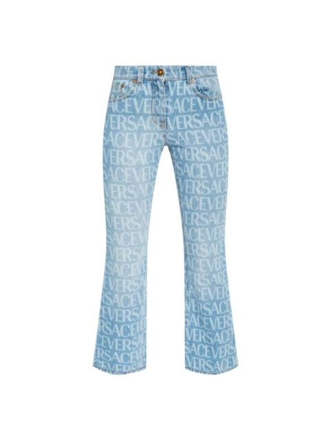 VERSACE Versace All Over Monogram Flare Denim Jeans, Waist Size 26"
