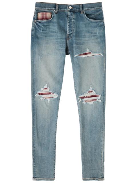Amiri MX1 Quad Distressed Skinny Jeans