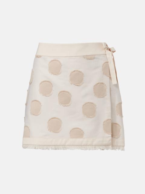 SIMKHAI Bethany polka-dot wrap skirt