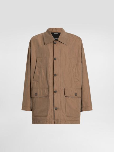 Technical fabric parka with tag