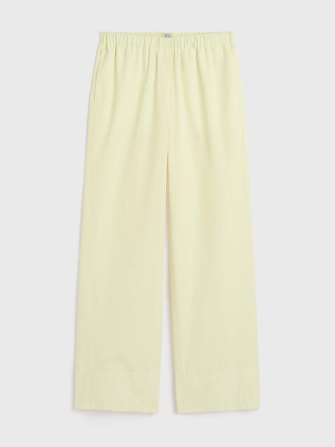 TOTEME Twisted seam boxer trousers straw