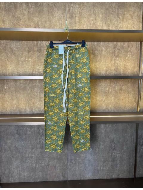 Loewe Loewe all-over floral pattern trousers