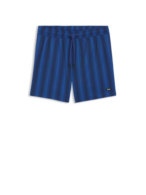 BOSS LOGO-BADGE SWIM SHORTS WITH STRIPE
