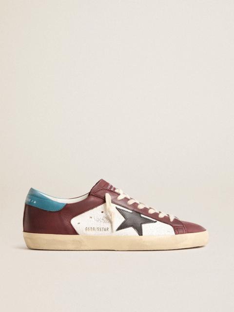 Golden Goose Men’s Super-Star in crackle leather with brown star and teal heel tab