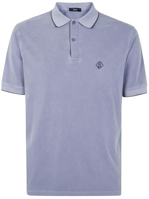 Herno The MAN POLO SHIRT, a refined piece from HERNO, exemplifies contemporary elegance in the clothing ca