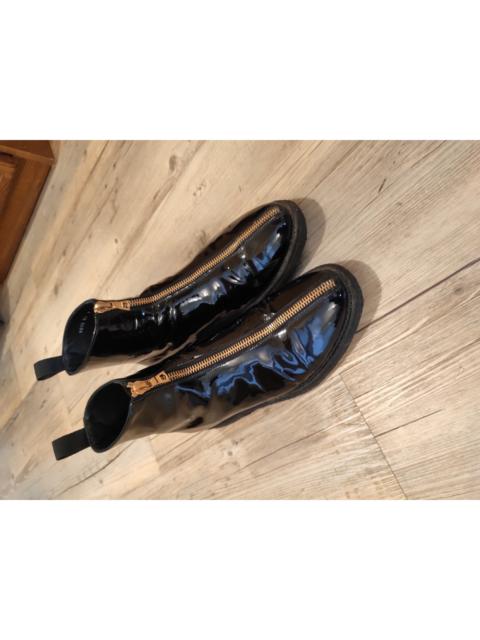 Other Designers Denis Simachev - Black polished leather front zip boots.Like Saint Laurent