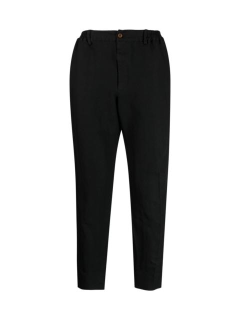 BLACK COMME des GARÇONS CHEVRON-PATTERN TAPERED TROUSERS