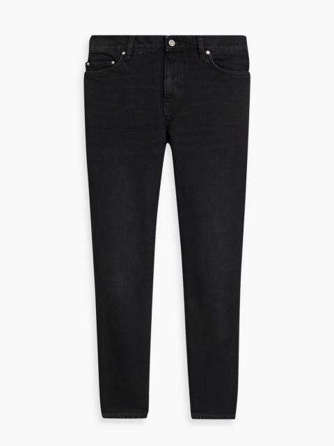 TOTEME Low-rise tapered jeans