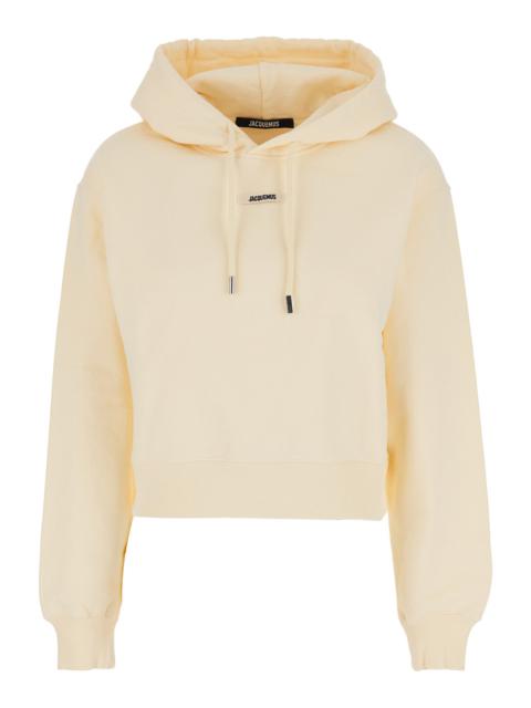JACQUEMUS Jacquemus Women 'Le Hoodie Gros Grain' Beige Cropped Hoodie With Drawstring Hood And Logo Patch On T