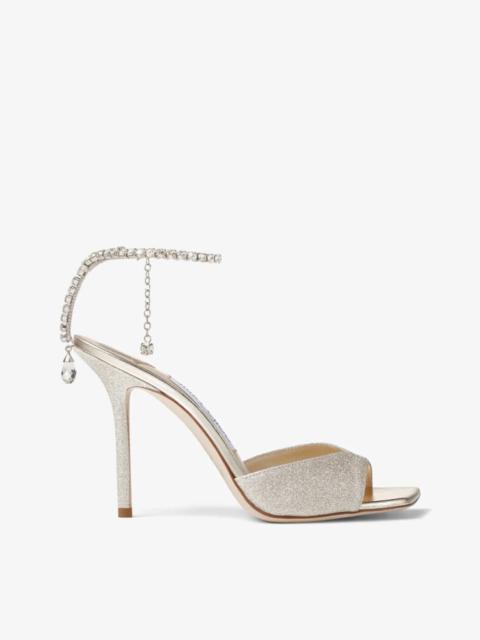 JIMMY CHOO Saeda Sandal 100
Platinum Ice Dusty Glitter Sandals with Crystal Embellishment