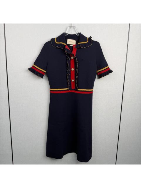 GUCCI Gucci knit dress with gold thread, ruffles, and pearl buttons.
