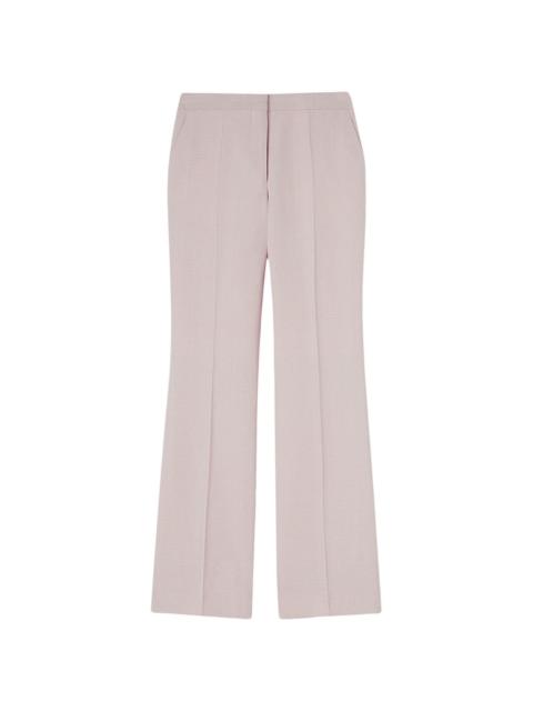 pressed-crease tailored trousers