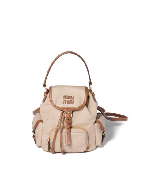 Miu Miu flap leather canvas backpack