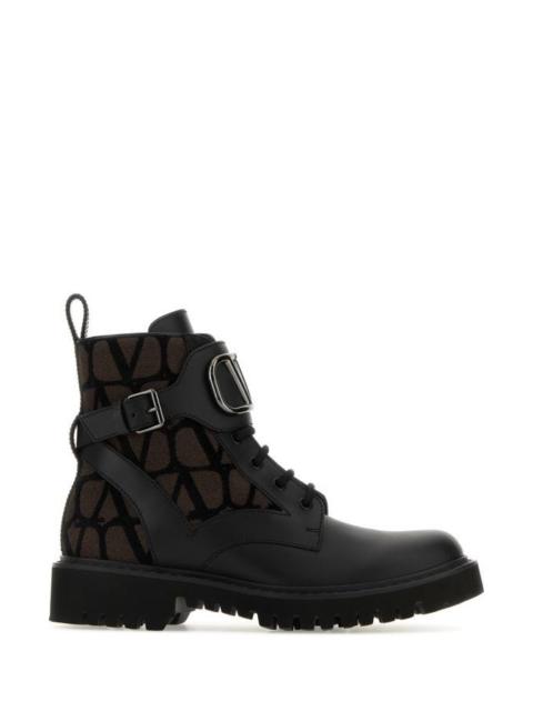 Valentino Two-tone leather and Toile Iconographe Logo Combat ankle boots