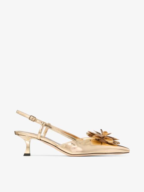 JIMMY CHOO Mimmi  Sling Back 50
Gold Liquid Metal Leather Slingbacks with Jimmy Choo Perforated Corsage
