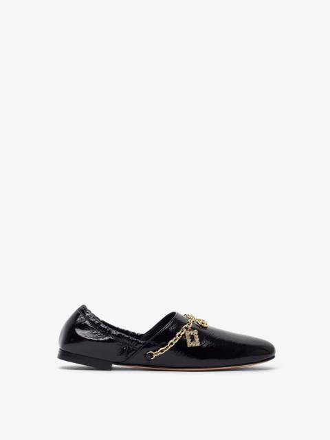 Roger Vivier Roundytoe black with gold charm slippers