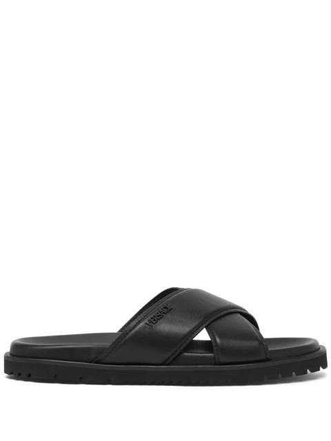 VERSACE logo-lettering leather slides
