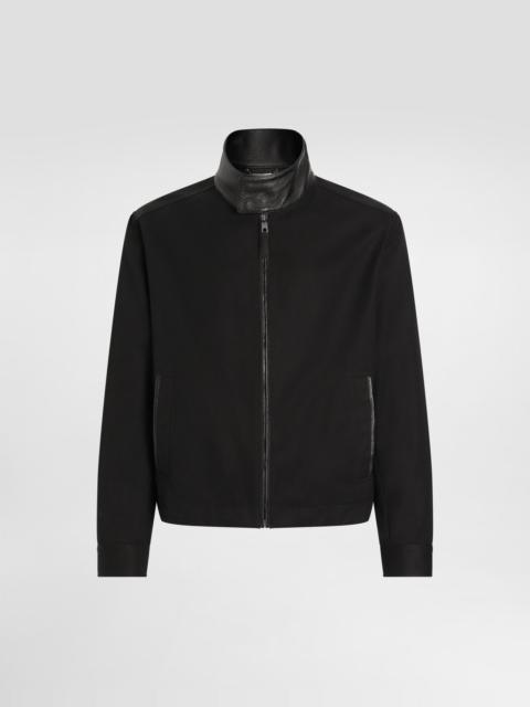 Dolce & Gabbana Leather and technical fabric jacket with a high neck and tag