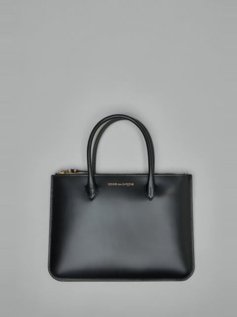 Comme Des Garçons Handles