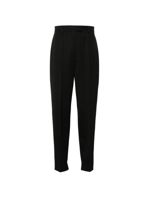 pressed-crease tapered-leg trousers