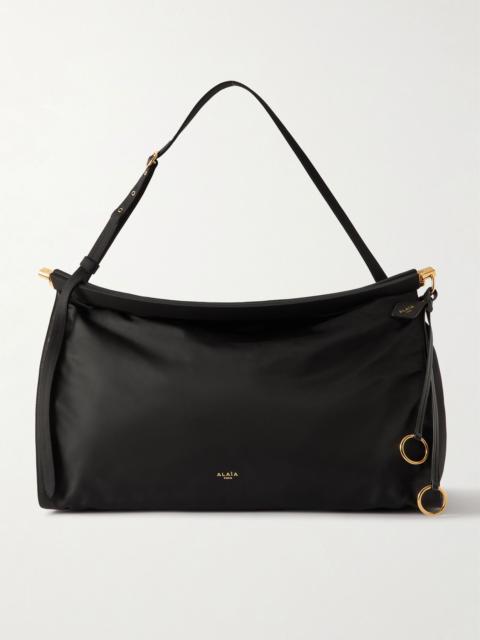 Alaïa Click E/W large leather-trimmed shell shoulder bag Black