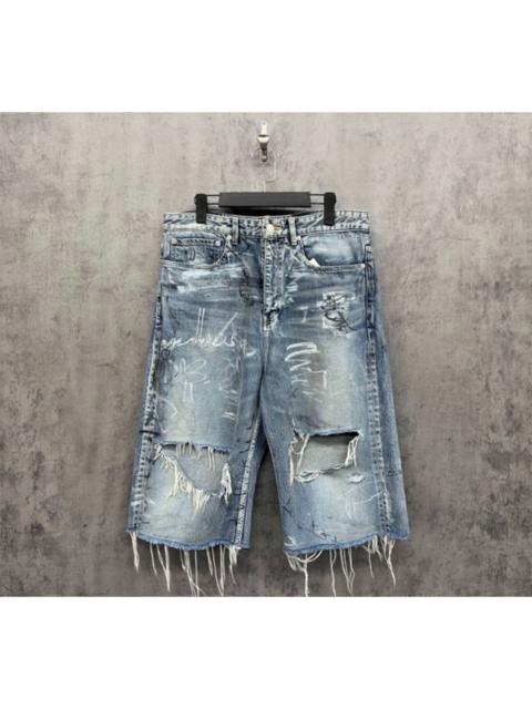BALENCIAGA Balenciaga Graffiti-Washed Distressed Cropped Jeans