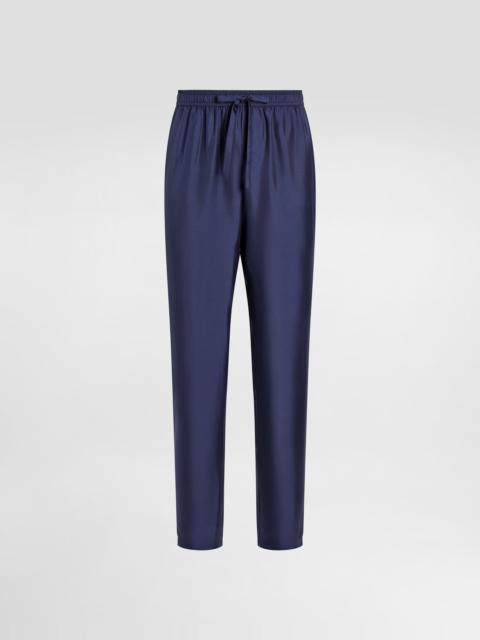 Dolce & Gabbana Silk jogging pants with DG embroidered patch