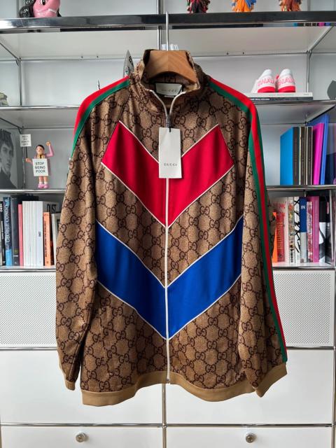 GUCCI Gucci red and blue striped all-over logo zip-up jacket