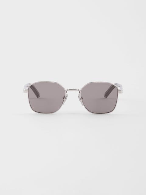 Prada Sunglasses with the iconic metal plaque
