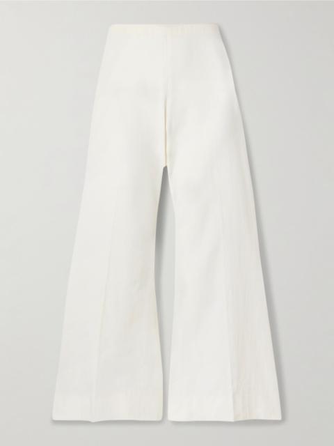 KHAITE Walter cotton-canvas flared pants Cream