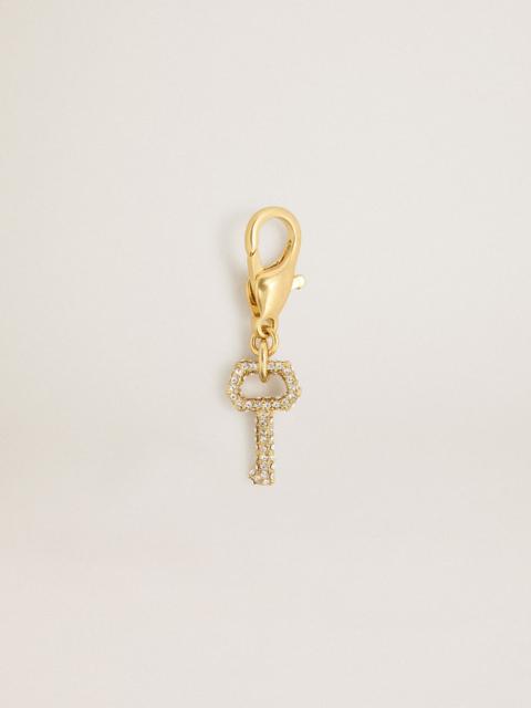Golden Goose Key-shaped charm in gold-colored brass with crystals