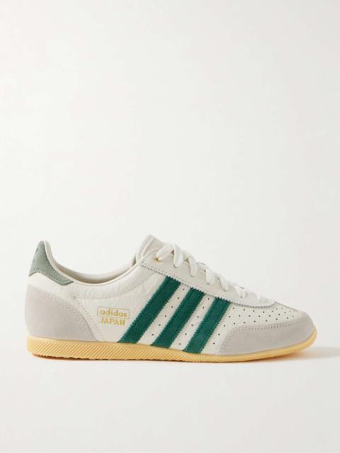 Japan suede-trimmed perforated leather sneakers Off-white